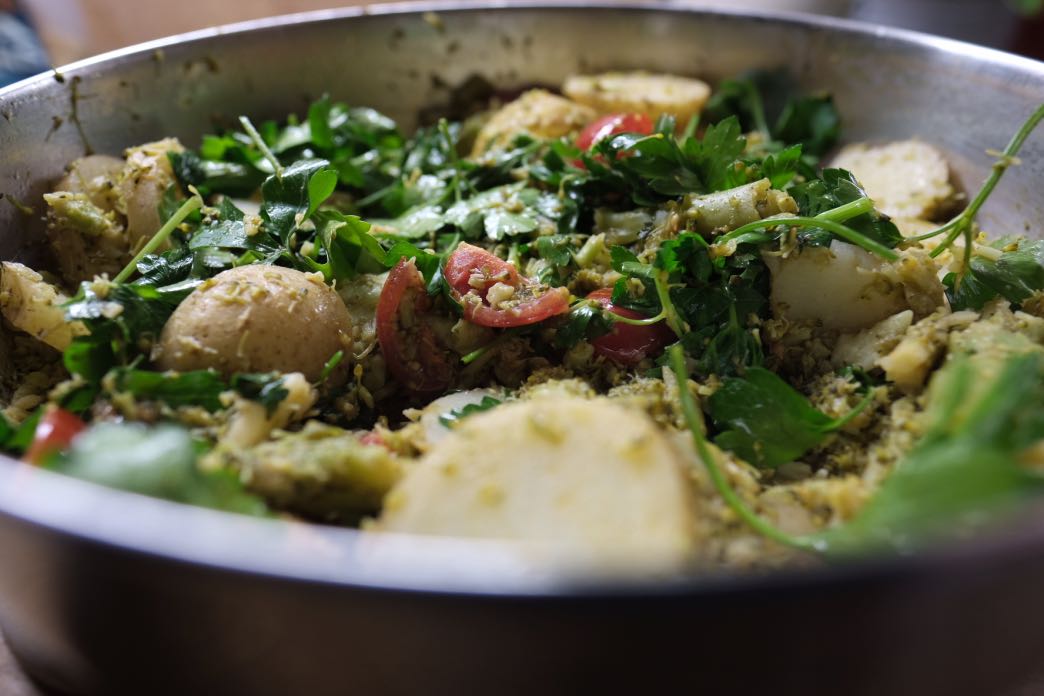 steamed potato and crushed broccoli side view