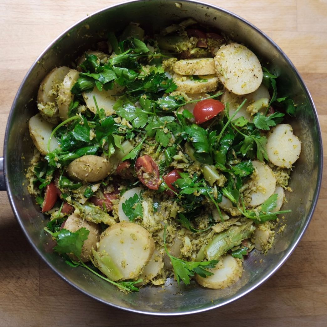 steamed potato and crushed broccoli top view