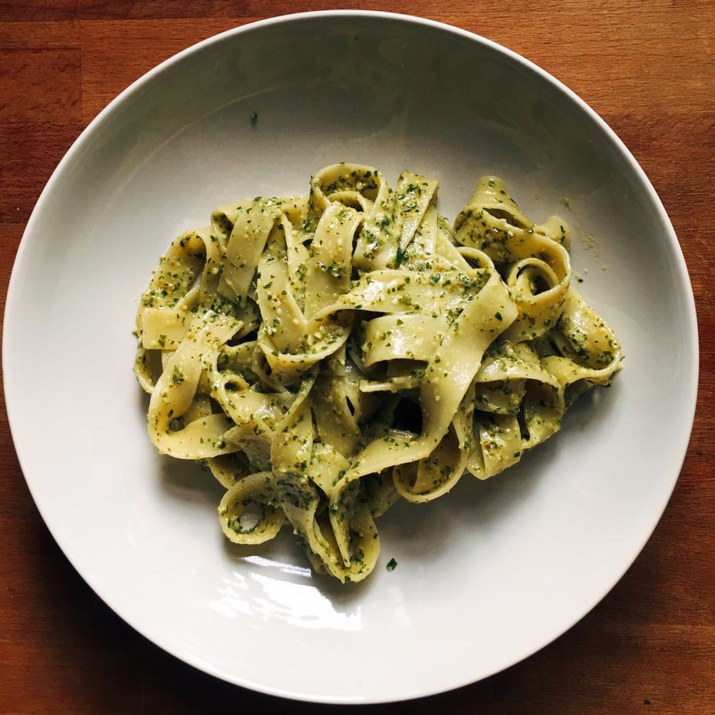 Ribbon pasta with flat leaf parsely pesto