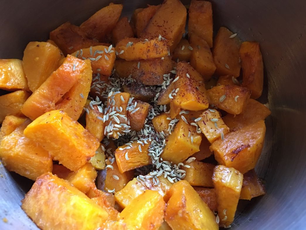 Cooked butternut squash ready to be mashed