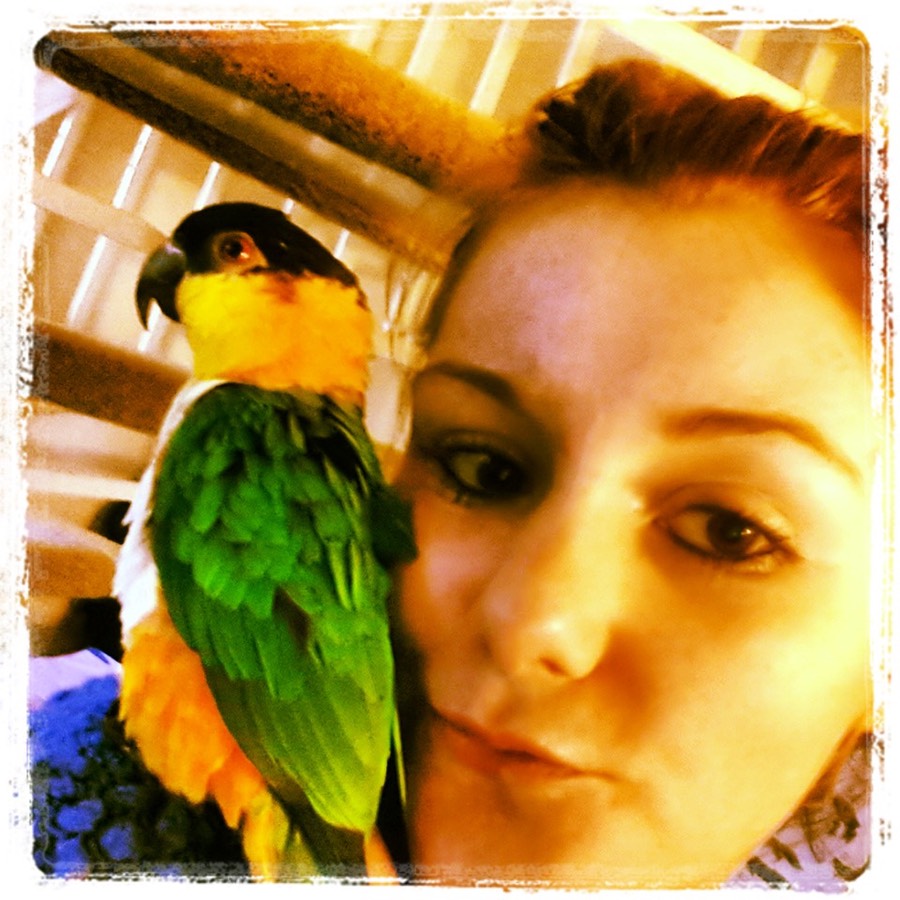 Nikki with parrot