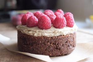 Orange seed cake with cashew nut cream and raspberries